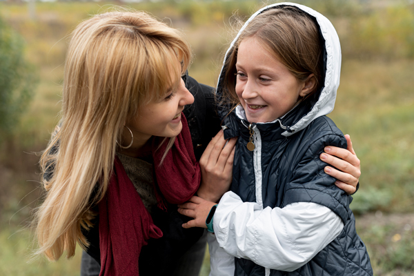 mother and daughter looking at each other